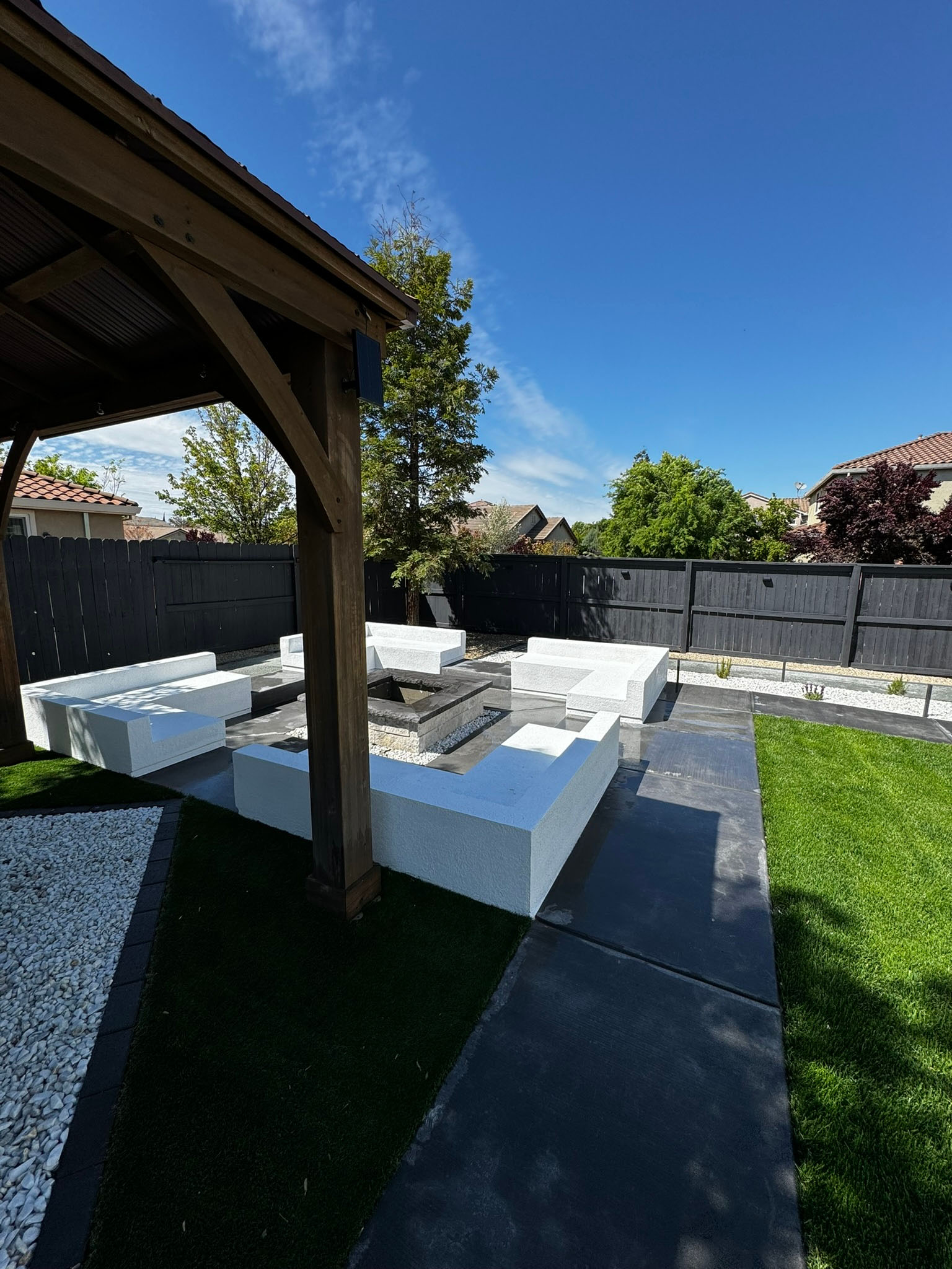 Turf play lawn adjacent to lap pool